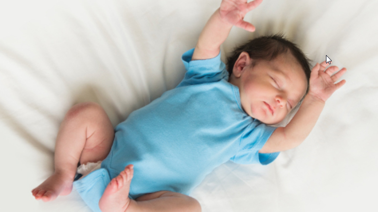 baby on blanket