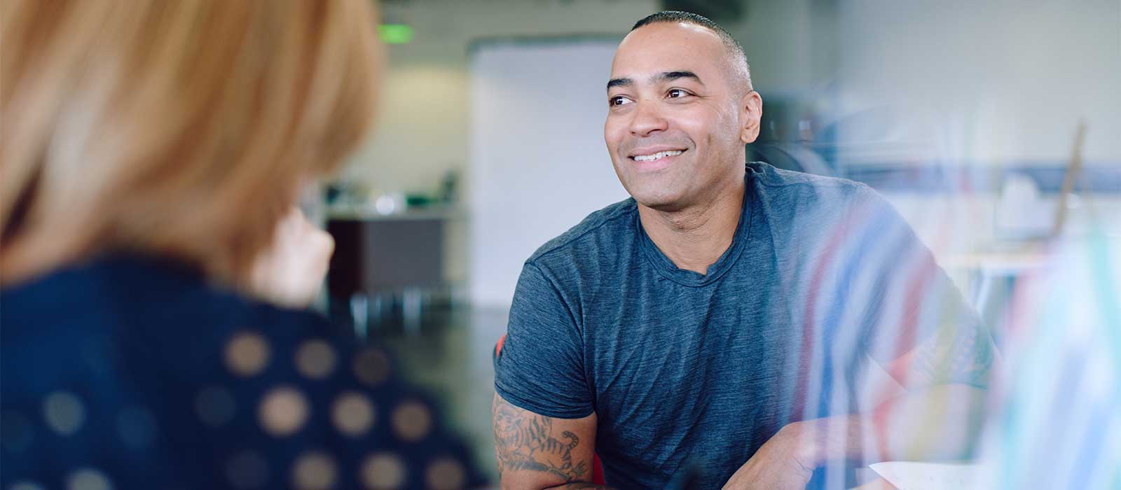 Man having positive interaction with counselor