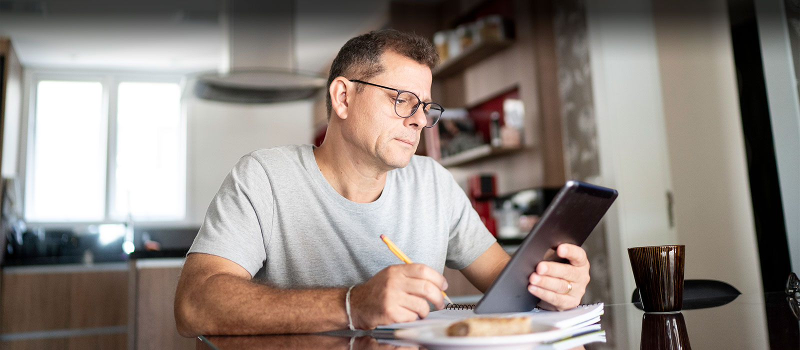 Middle aged man using laptop