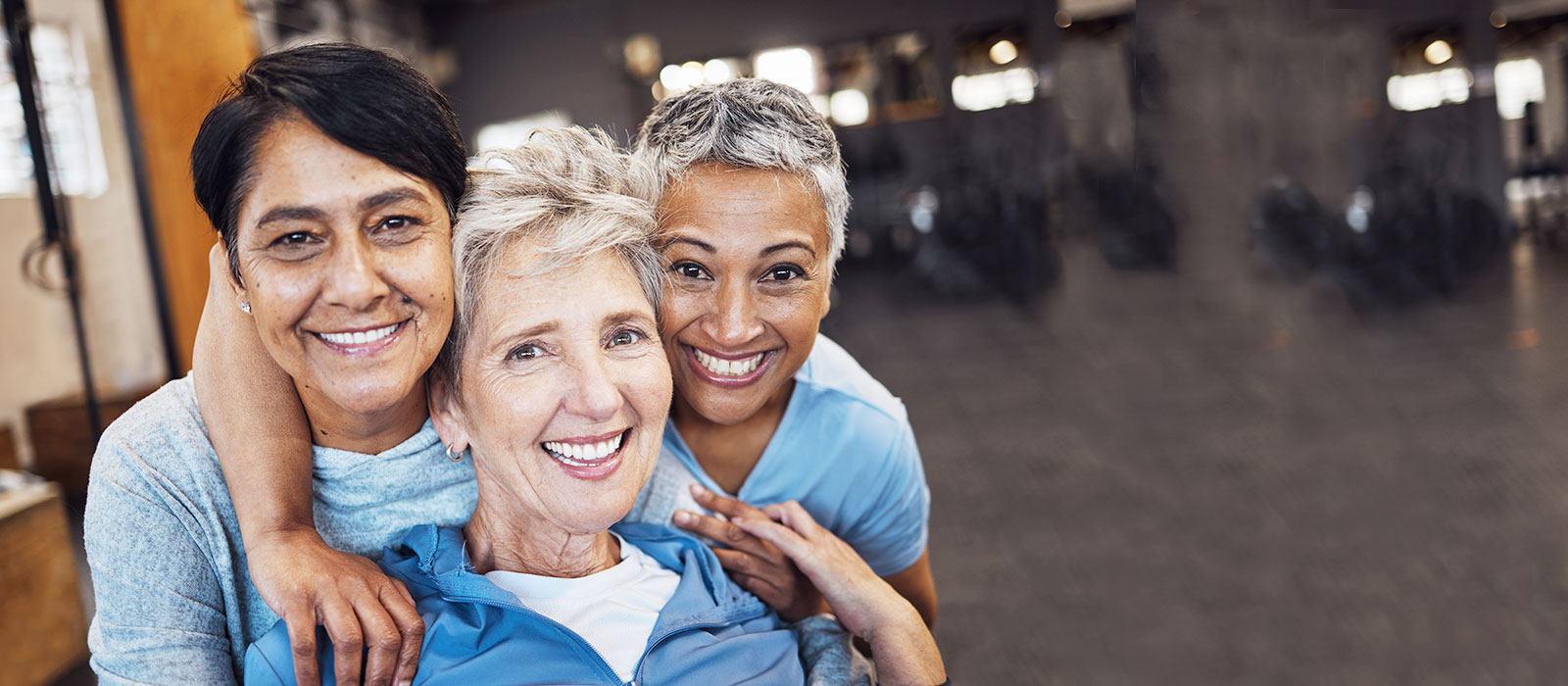 Three mature female gym friends 