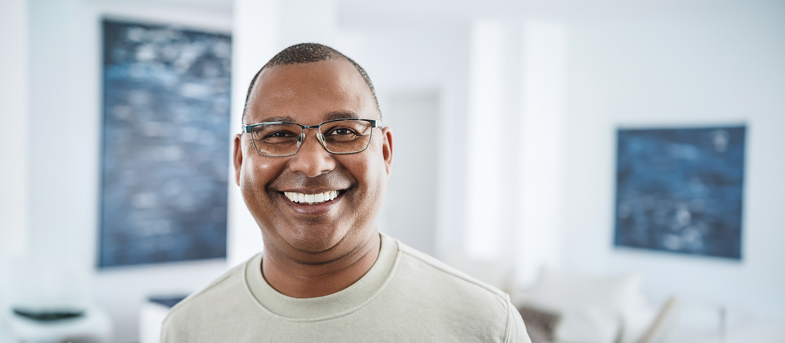 Smiling diverse middle aged man