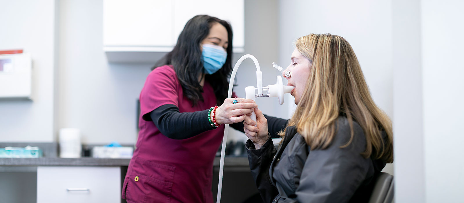 provider administering a test to a patient