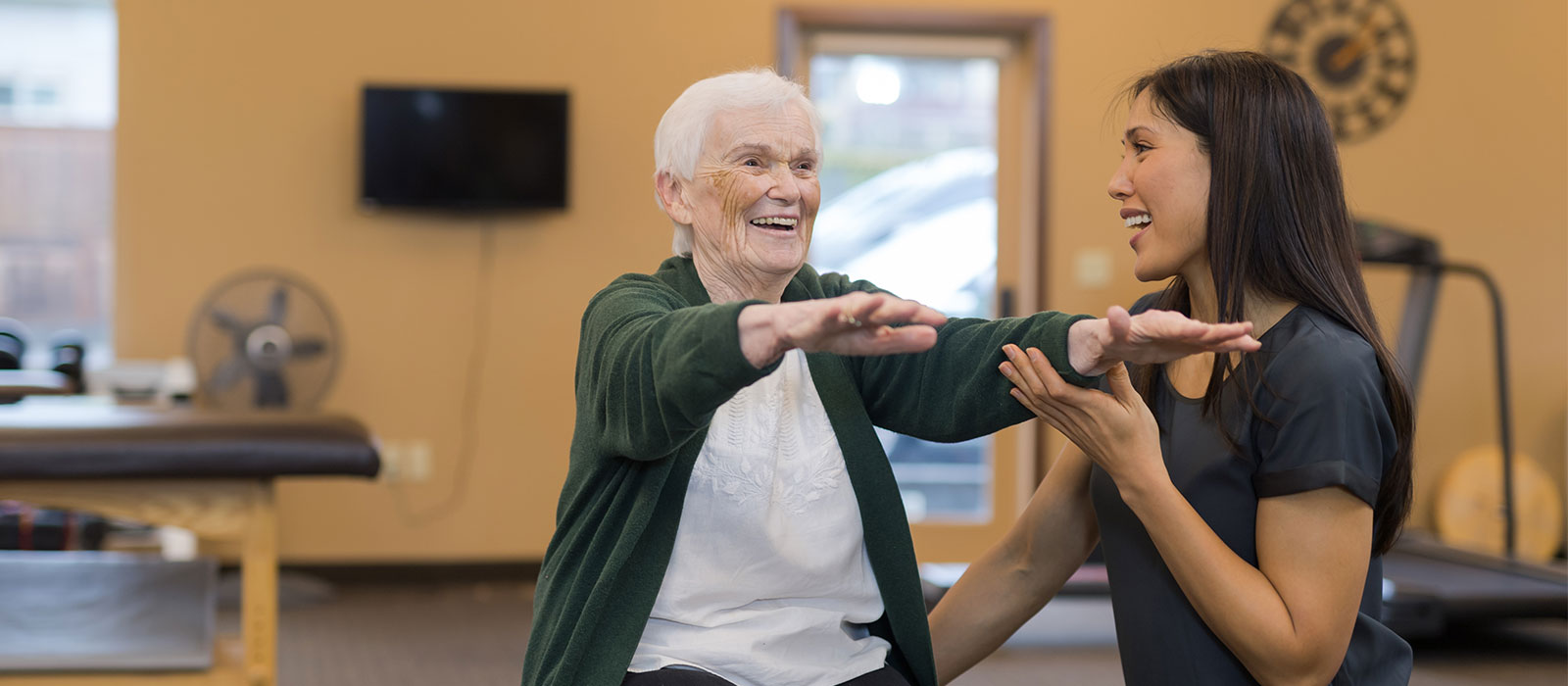 Senior female with rehab specialist