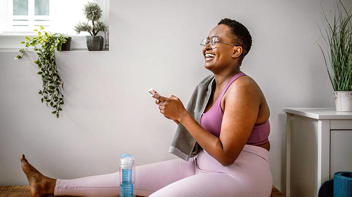 confident woman relaxing after workout