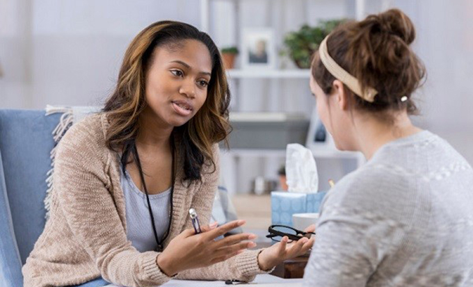 female provider and patient