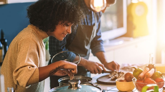 woman cooking at the stove